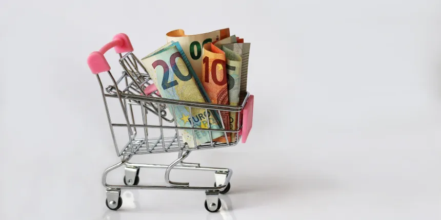 Einkaufswagerl mit Geldscheinen
