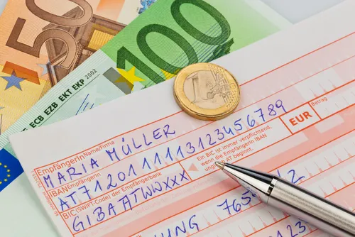 Foto von einem ausgefüllten Erlagschein mit österreichischem IBAN